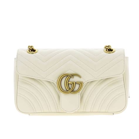 gucci ズボン|white Gucci bag.